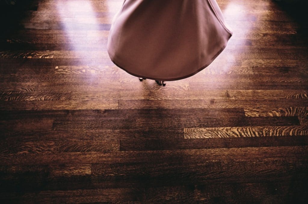 girl dancing on dust-free refinished hardwood floors
