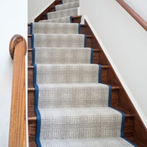 Beautiful wool stair runner with bold contrasting binding.png