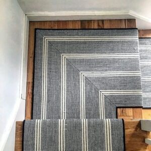 Stair runner with landing and striped pattern