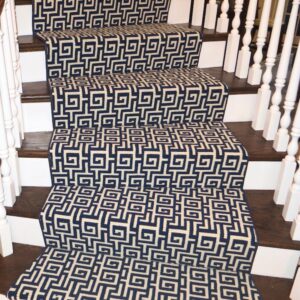 Statment curved stair runner with blue geometric design.png